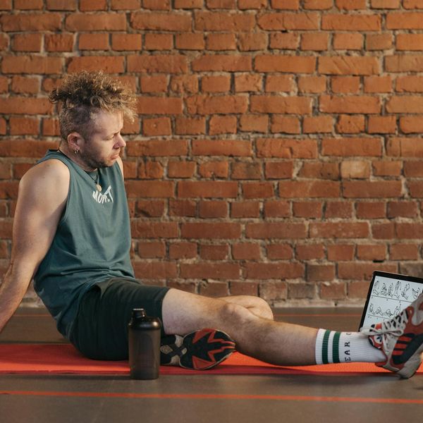 Smiling person feeling energetic after a workout session.